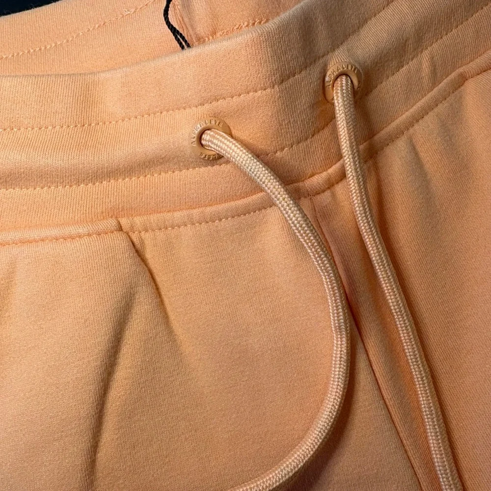 Alphalete NWT Essential Core Orange Frost Shorts- Size Small - Picture 3 of 5